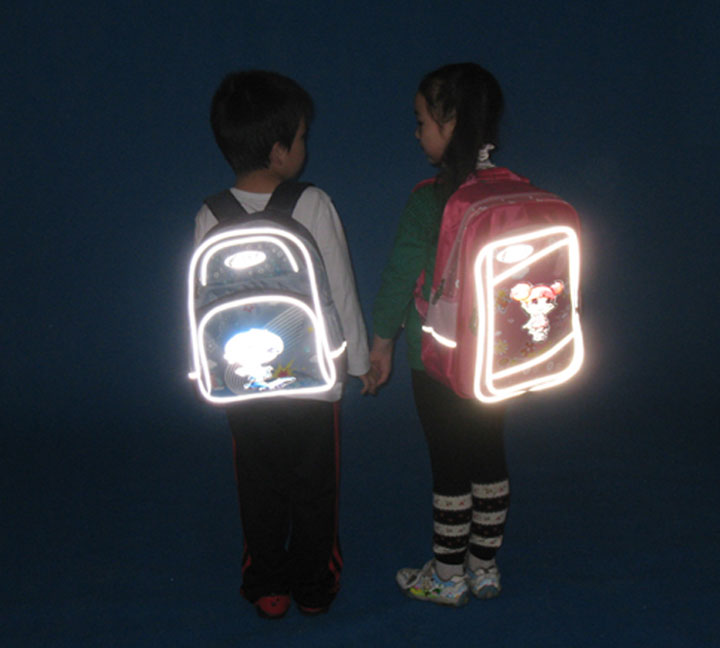 Reflective tape on school bag more secure