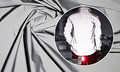 Tecido refletivo externo