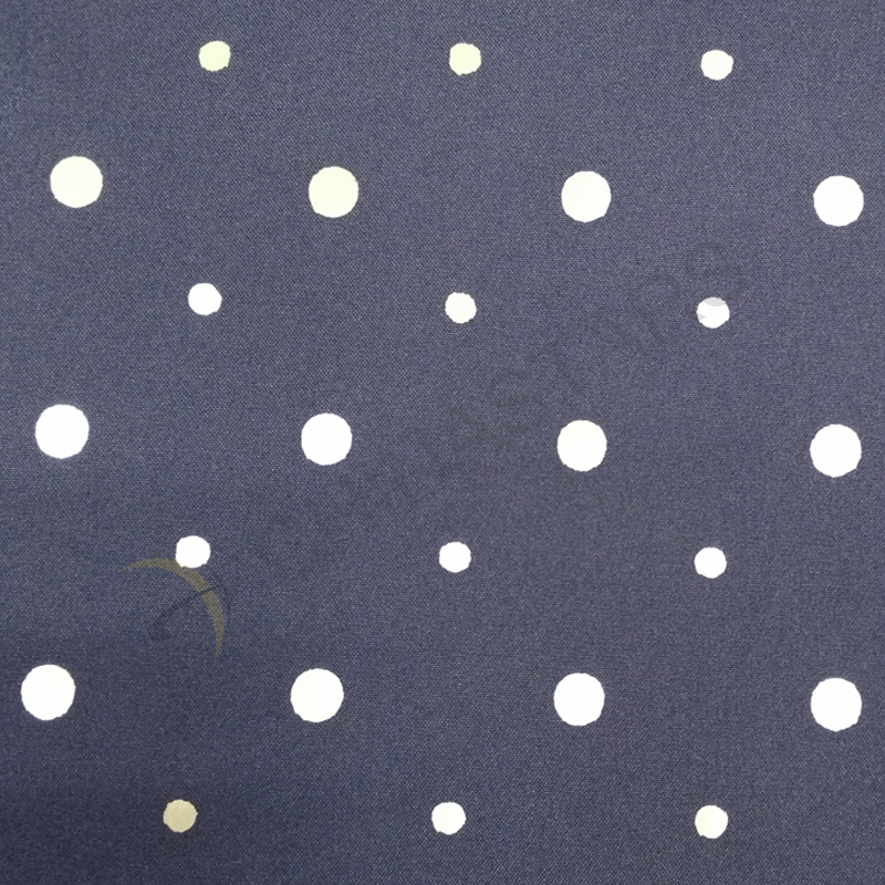 Dot pattern reflective fabric for outdoor clothing