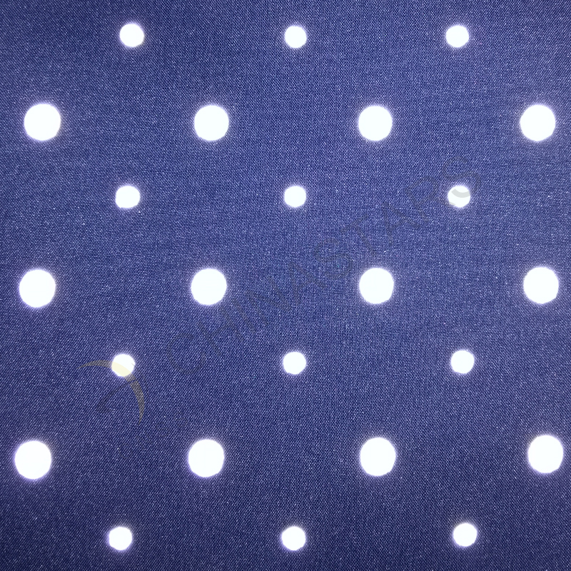 Dot pattern reflective fabric for outdoor clothing