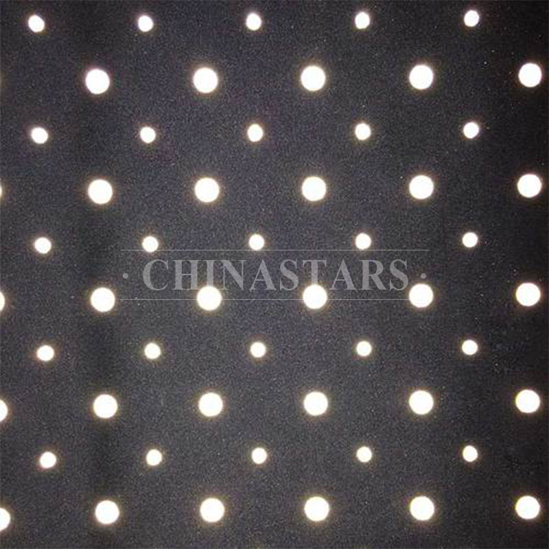 Dot pattern reflective fabric for outdoor clothing