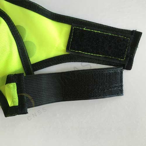 Dog safety vest with reflective bones pattern