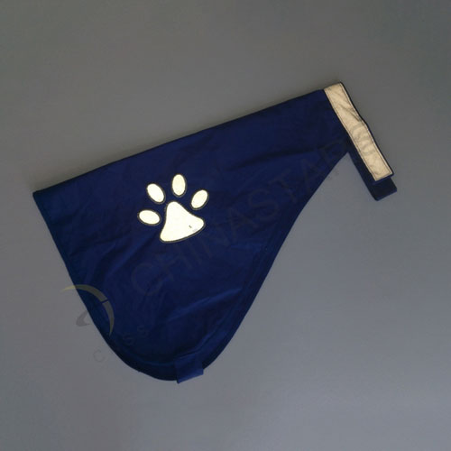 Navy blue dog safety vest with paw pattern