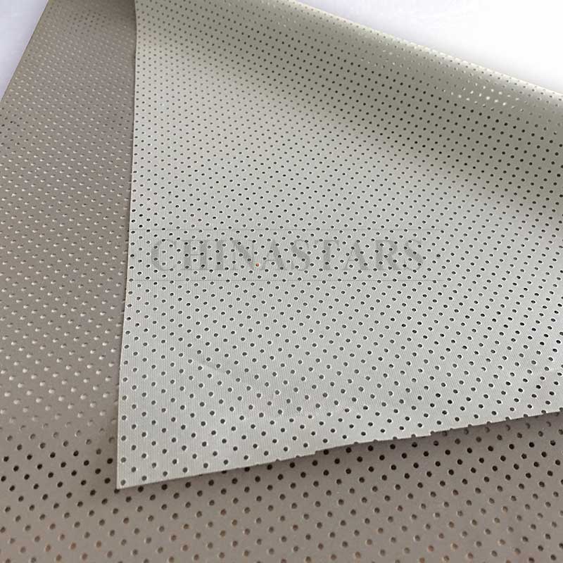 Perforated reflective fabric for outdoor clothing