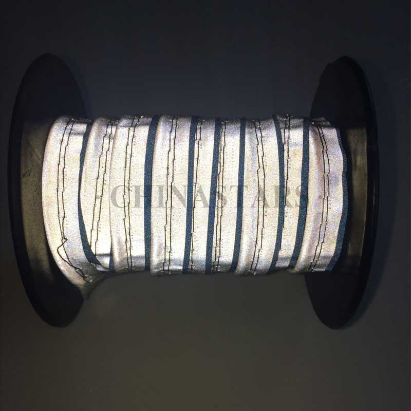 Double layer reflective piping tape for clothing