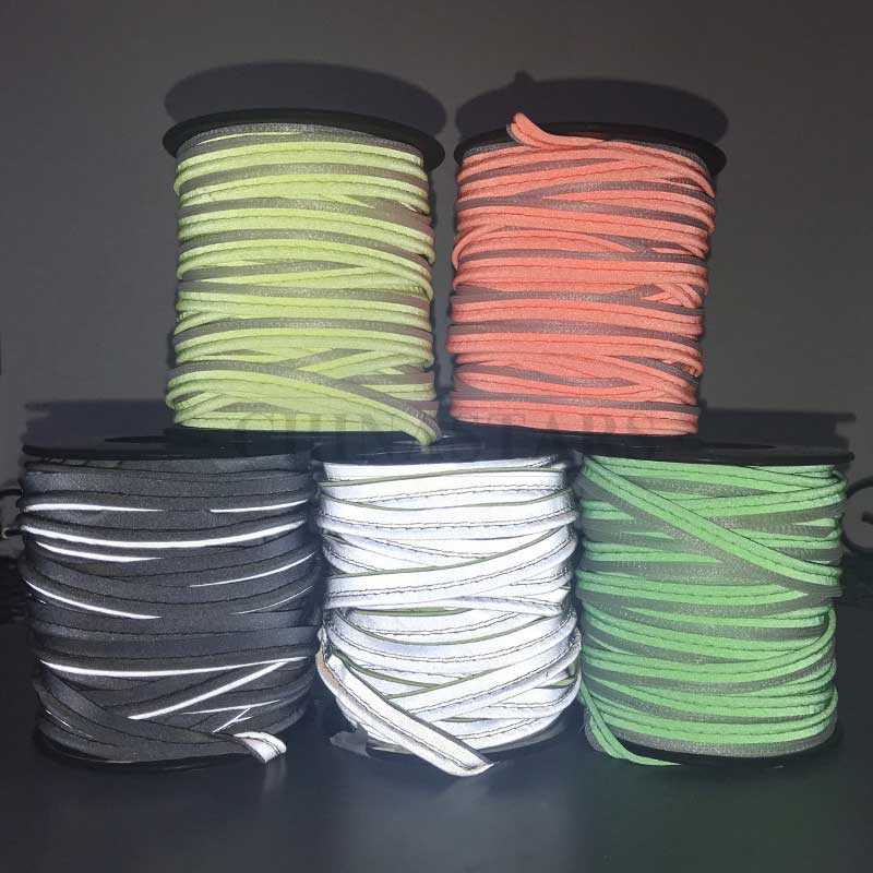 Colored reflective piping and binding tape