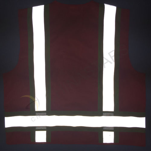 Orange reflective safety vest with warning tape