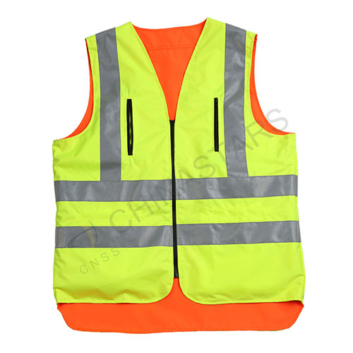 Reversible, double colored reflective safety vest