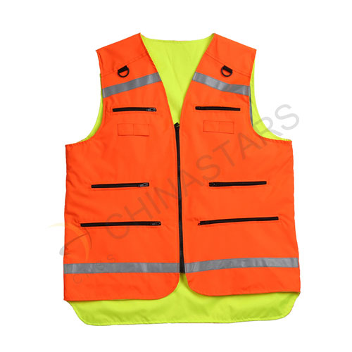 Reversible, double colored reflective safety vest