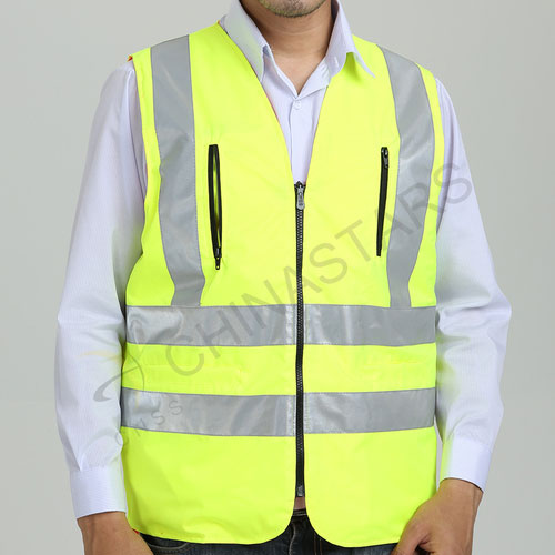 Reversible, double colored reflective safety vest