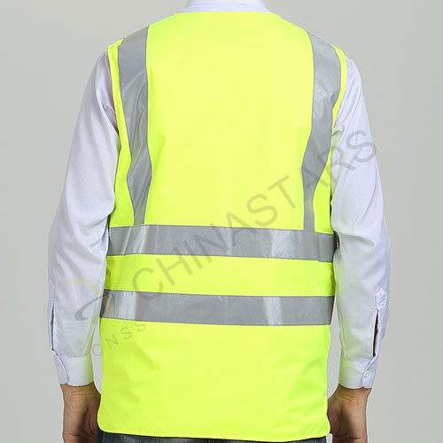 Reversible, double colored reflective safety vest