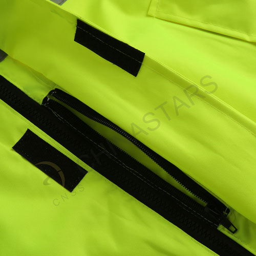 Enhanced visibility reflective raincoat