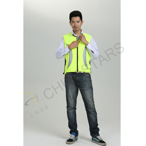 Safety vest with crescent-shaped reflective fabric