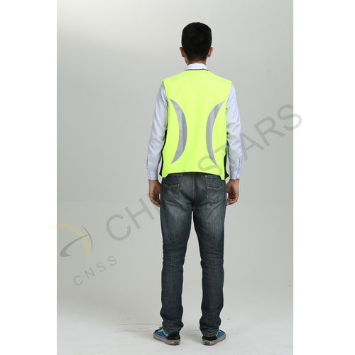 Safety vest with crescent-shaped reflective fabric