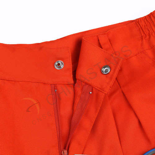 Pantaloni arancioni fluorescenti ad alta visibilità