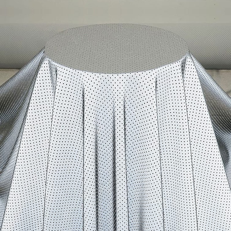 Perforated reflective fabric