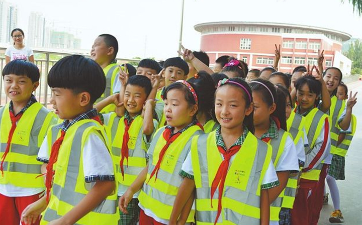 Walk home safety with a reflective vest after night school study