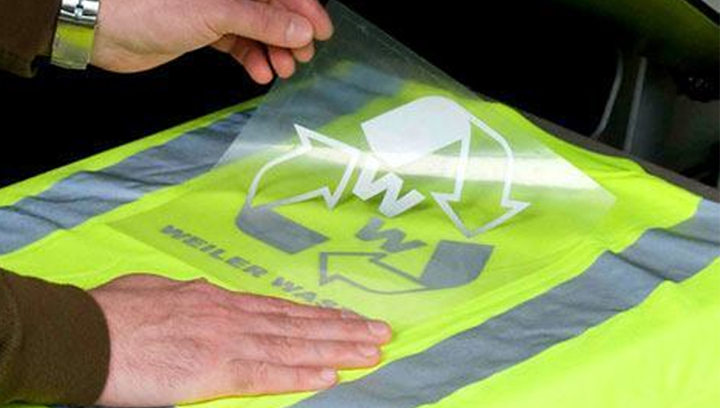 Reflective heat transfer film for vest slogans