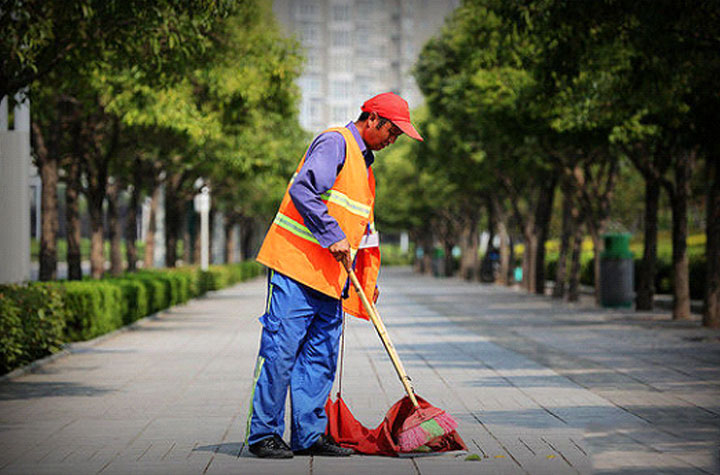 Why the sanitation workers have to wear reflective vests