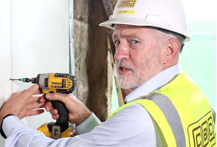Labor leader worn reflective vest when visiting construction site