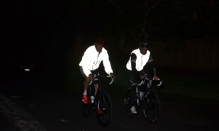 What are the functions of reflective cycling clothing