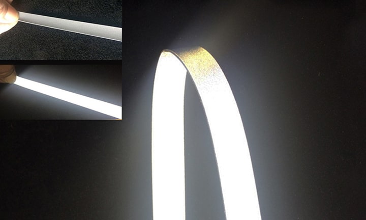 Double-sided stretch reflective fabric